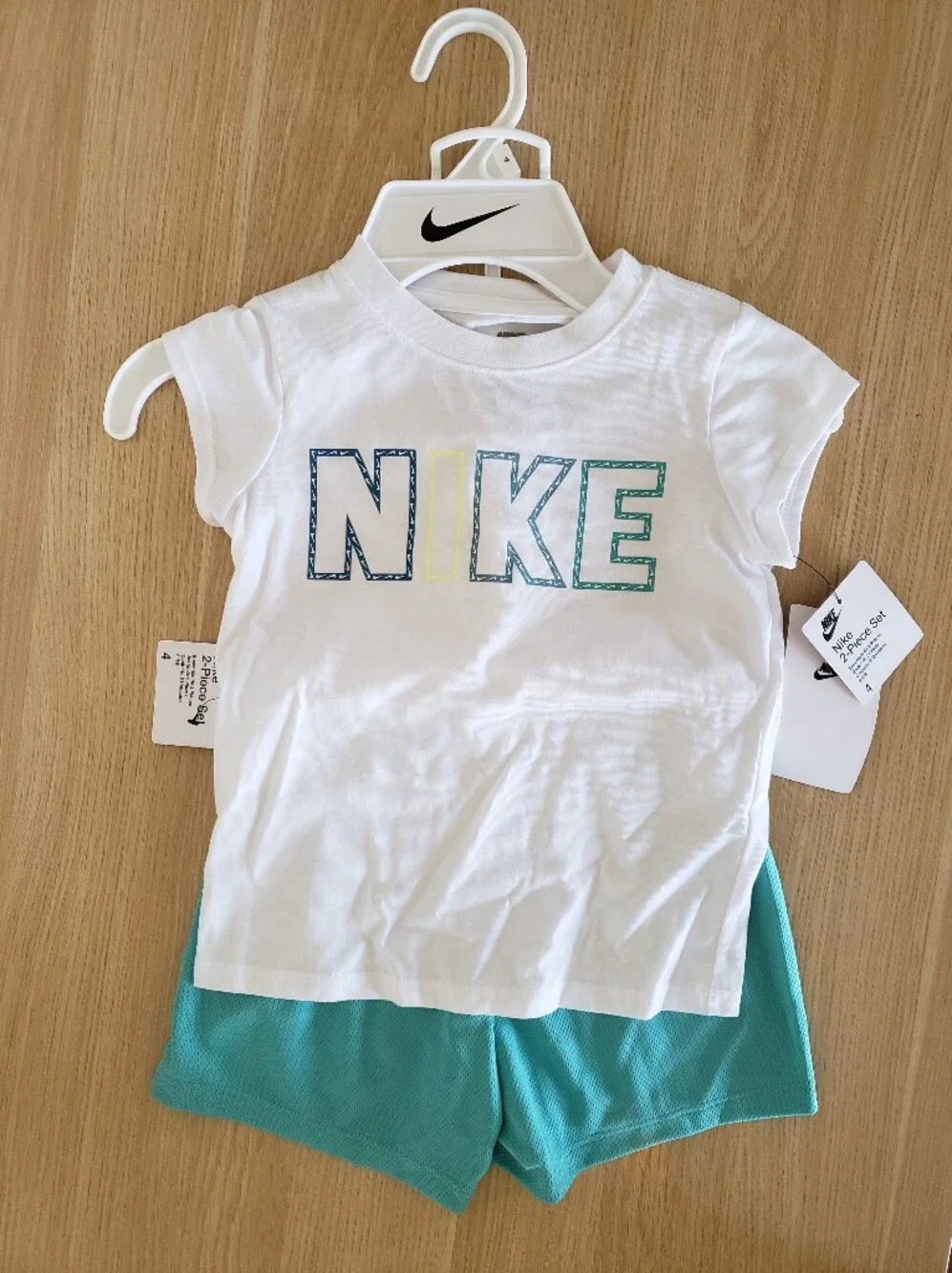 Nike Girls' White Graphic Logo Tee - Blue/Green Accent
